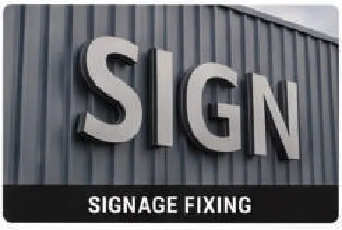 Lettering and signage panel mounted on profiled metal cladding