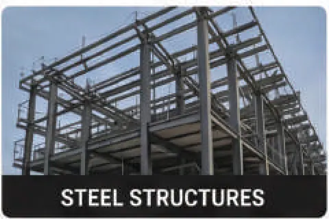 Structural steel frame bolted down to concrete foundations