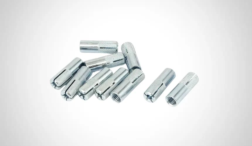 Zinc plated internally threaded drop-in anchors with knurled bodies and internal expansion cones