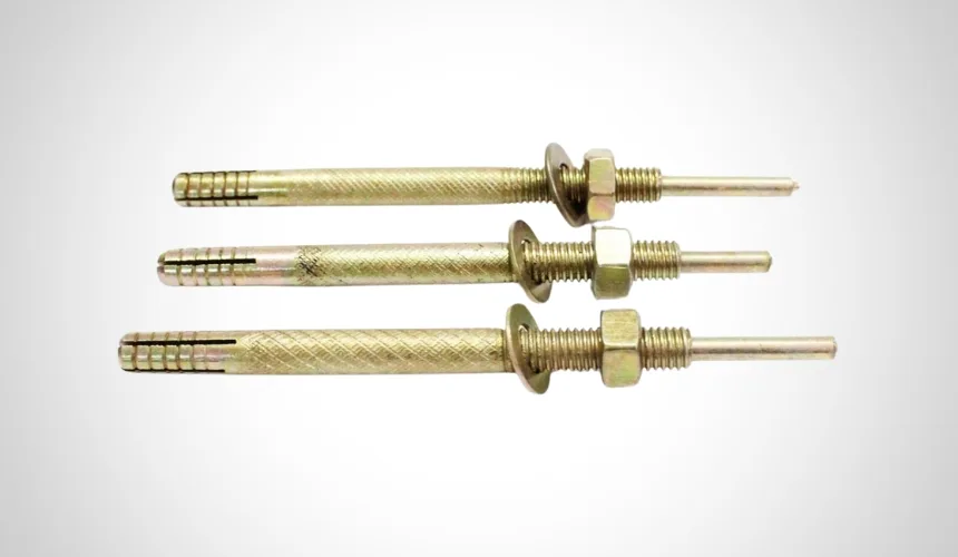 Brass and zinc plated pin type hammer-set anchors with drive pins, nuts and washers