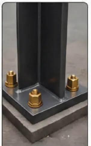 Steel column base plate fixed to concrete with rawl bolts