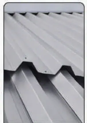 Profiled metal roofing sheet and flashing detail